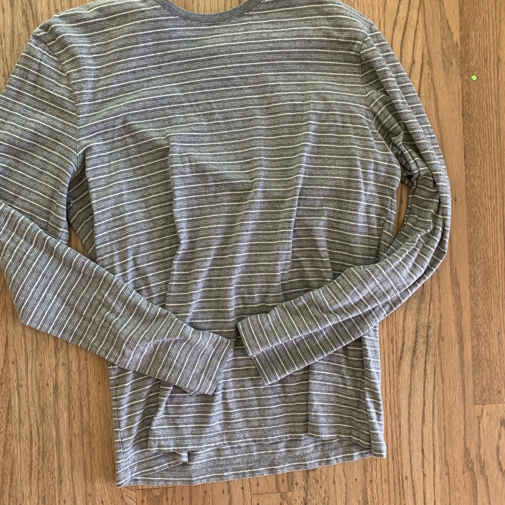 Medium banana republic long sleeve light grey and white striped shirt.